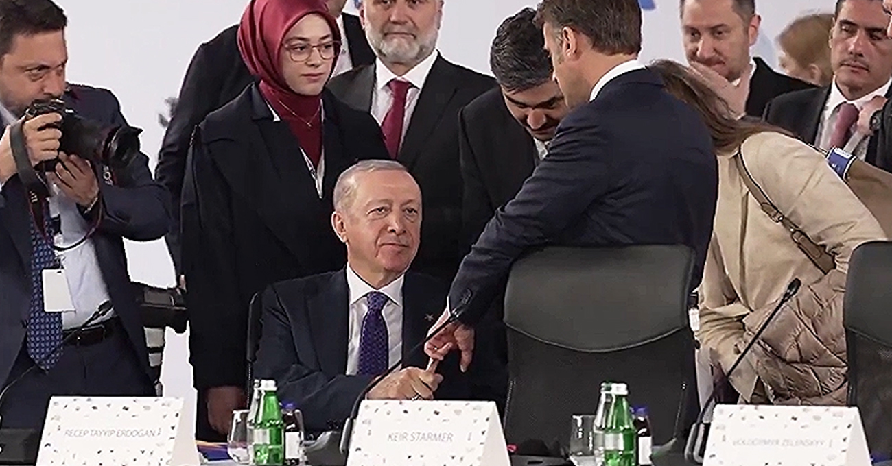 Erdogan Grabs Macron’s Finger –