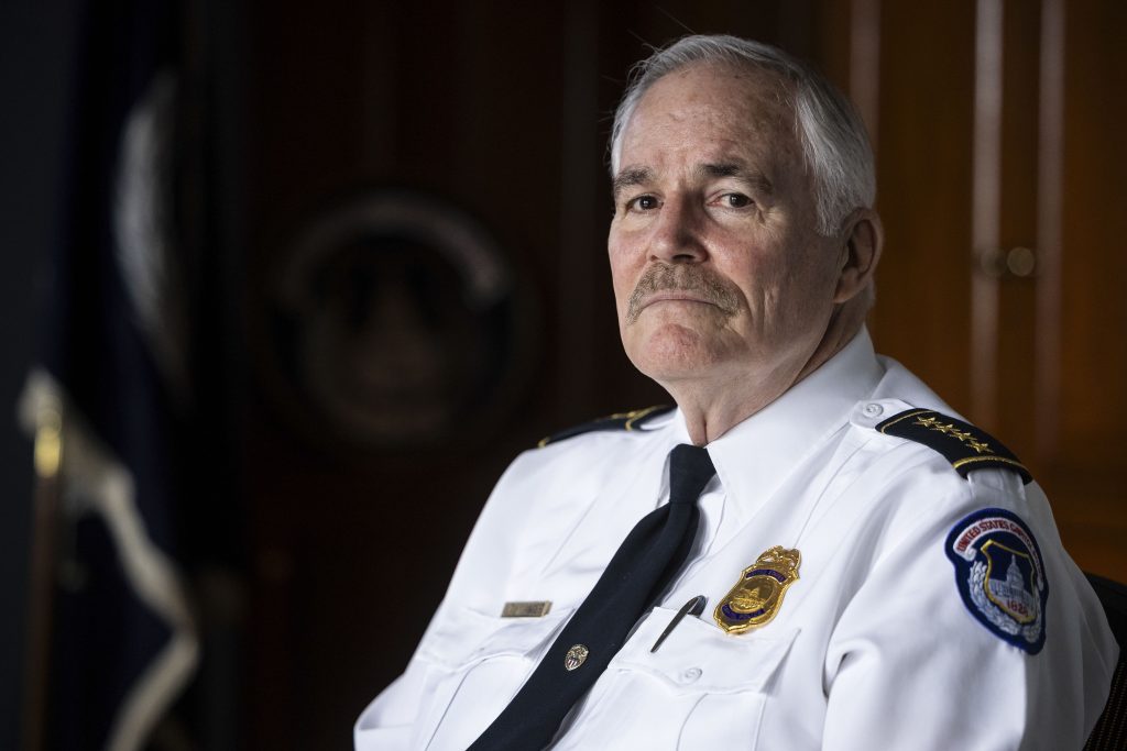 A retiring chief strains to keep the Capitol Police above the partisan fray